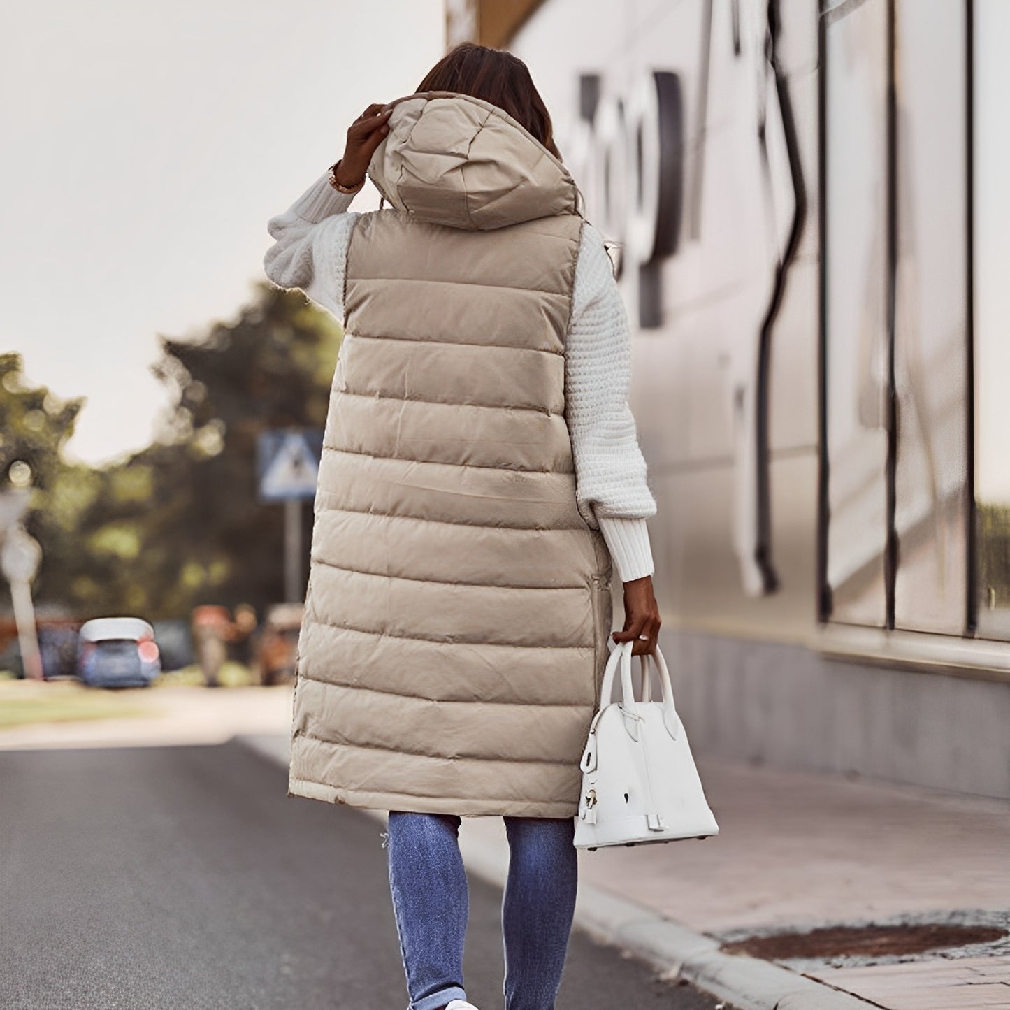 Brenna - Elegante lange Daunenjacke für Damen