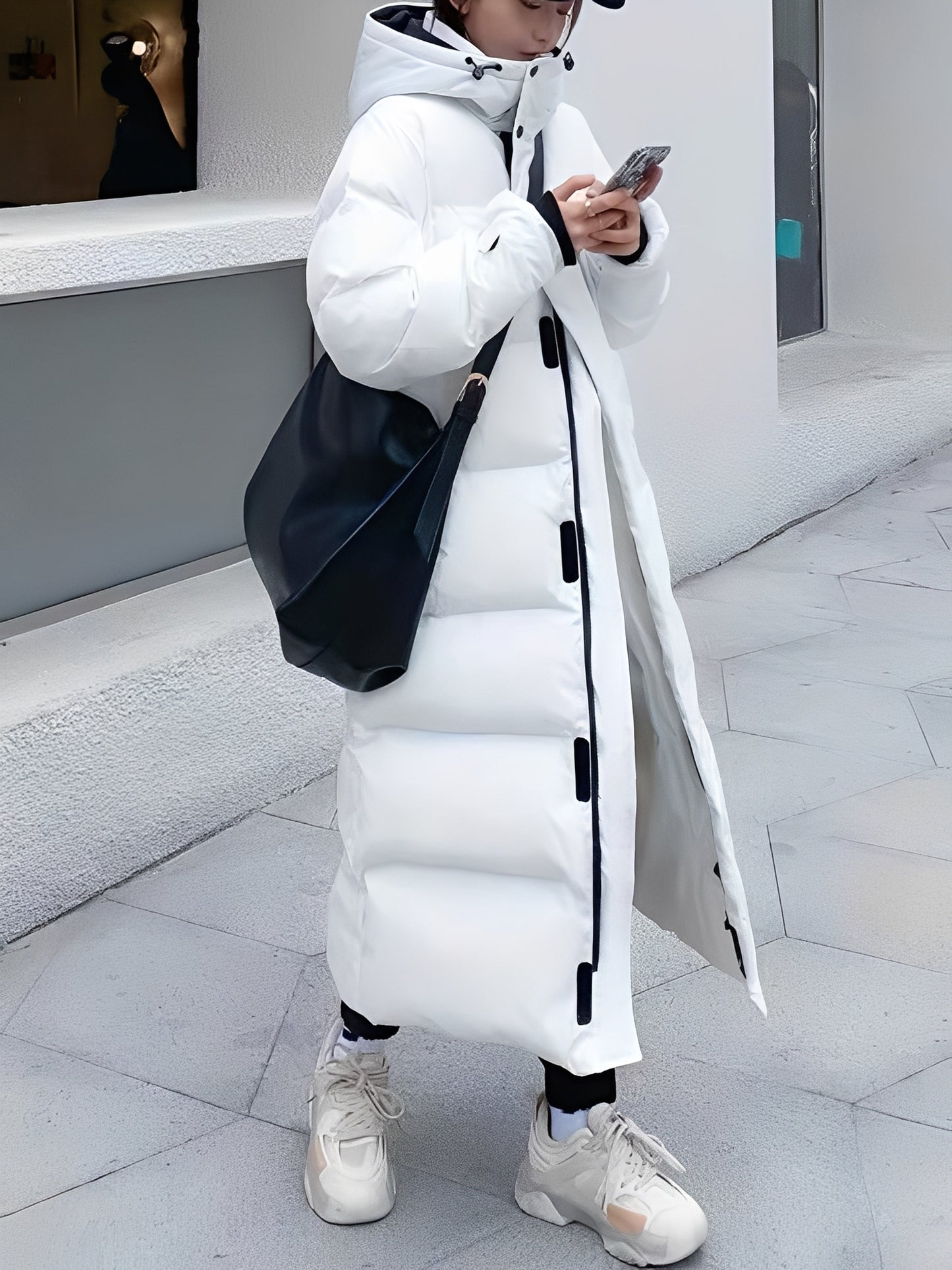 Hazel - Trendige lange Kapuzenjacke für Damen